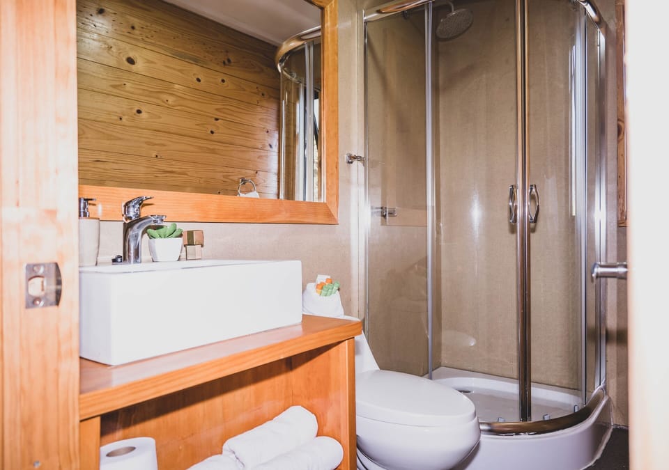 Superior Room, 1 King Bed, Non Smoking | Bathroom | Combined shower/tub, rainfall showerhead, free toiletries