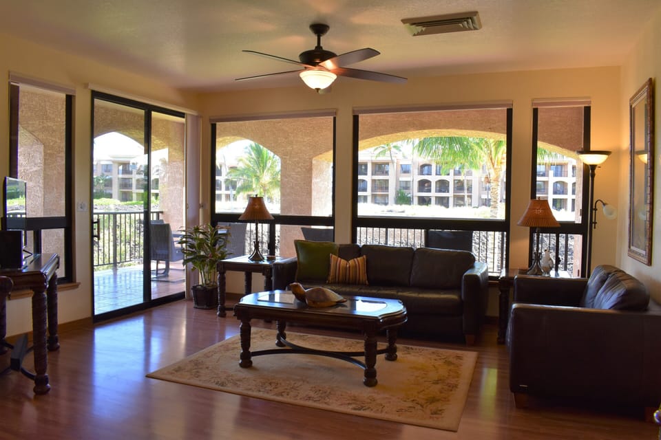 Spacious living area leads to the lanai.  Large screen TV and sound bar.