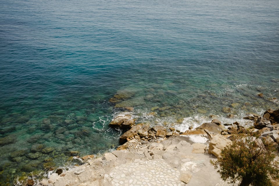 Private beach, black sand, sun loungers, beach umbrellas