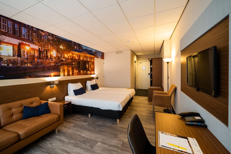 Hypo-allergenic bedding, desk, iron/ironing board, cribs/infant beds