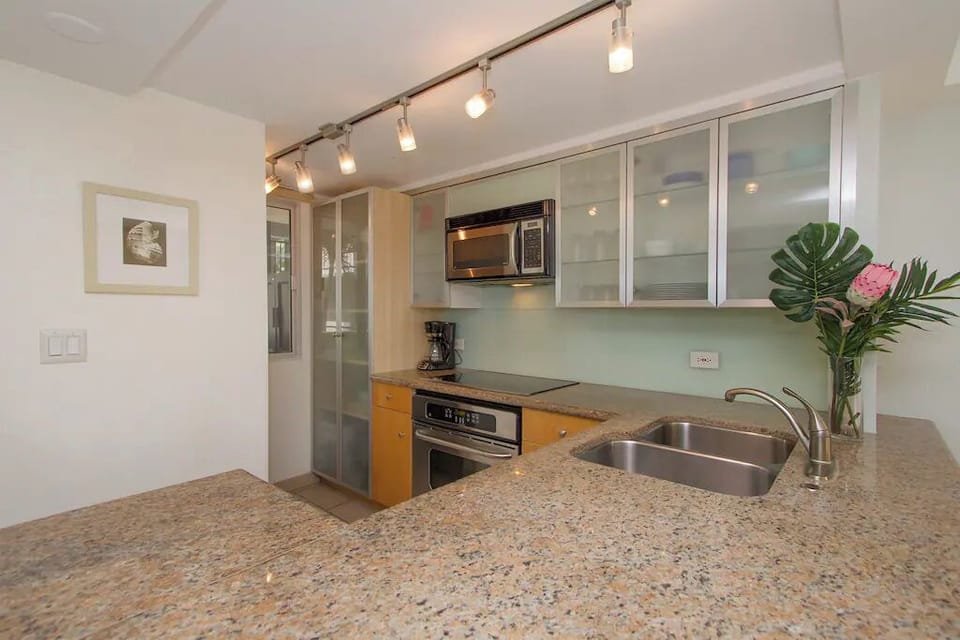 Signature Condo | Private kitchen | Full-size fridge, microwave, coffee/tea maker, electric kettle
