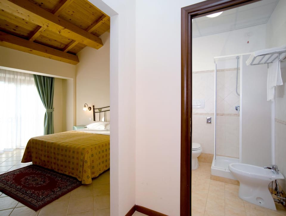 Premium bedding, Select Comfort beds, blackout drapes, free WiFi