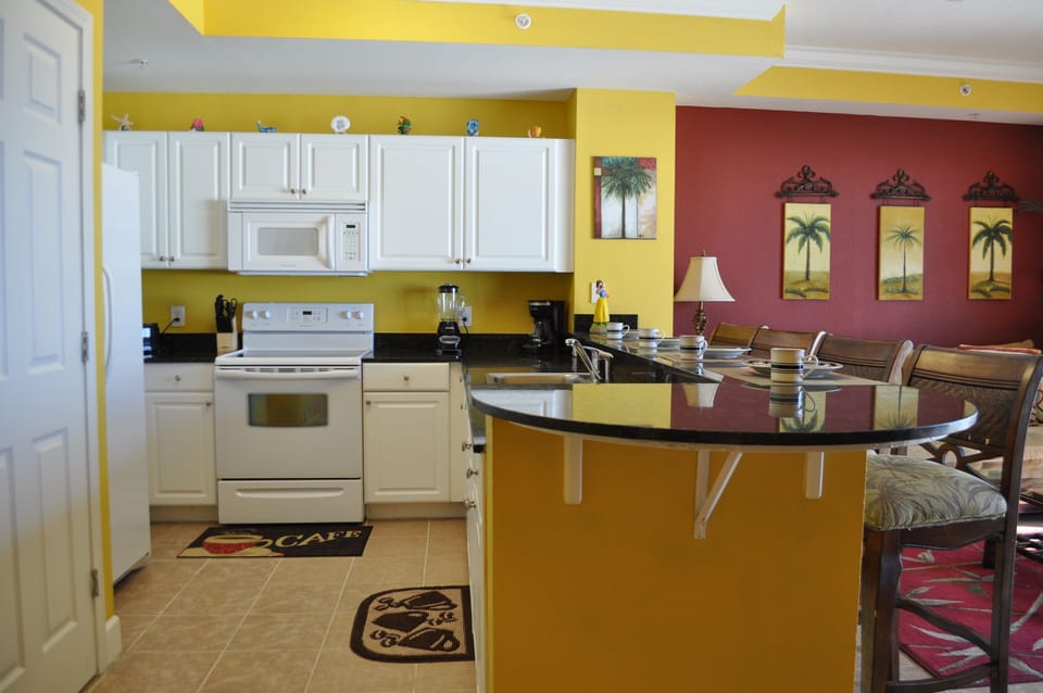 Another view of the kitchen with appliances