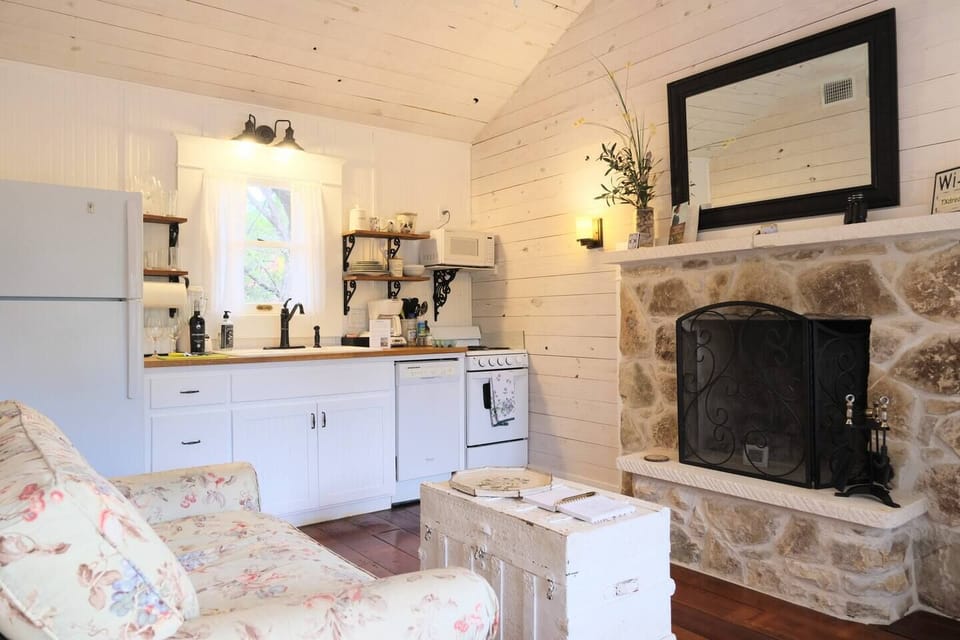 Deer Run Cottage features a small kitchen for guests who plan on cooking in. We stock coffee & filters, tea &  sugar.  Try our farm-fresh eggs from the chicken coop! Or simply relax by the wood burning fireplace.
