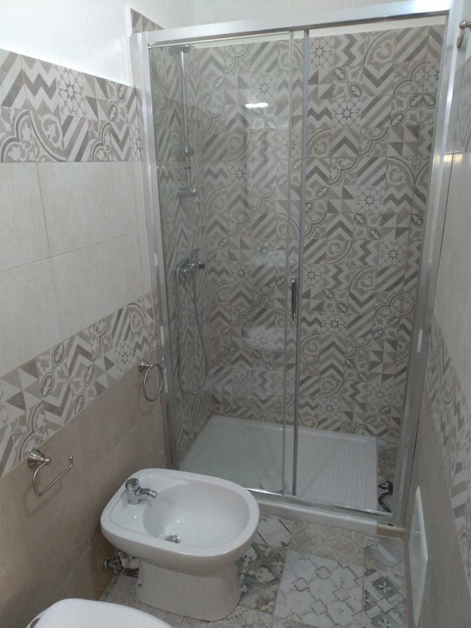 Quadruple Room | Bathroom | Shower, hair dryer, bidet, towels