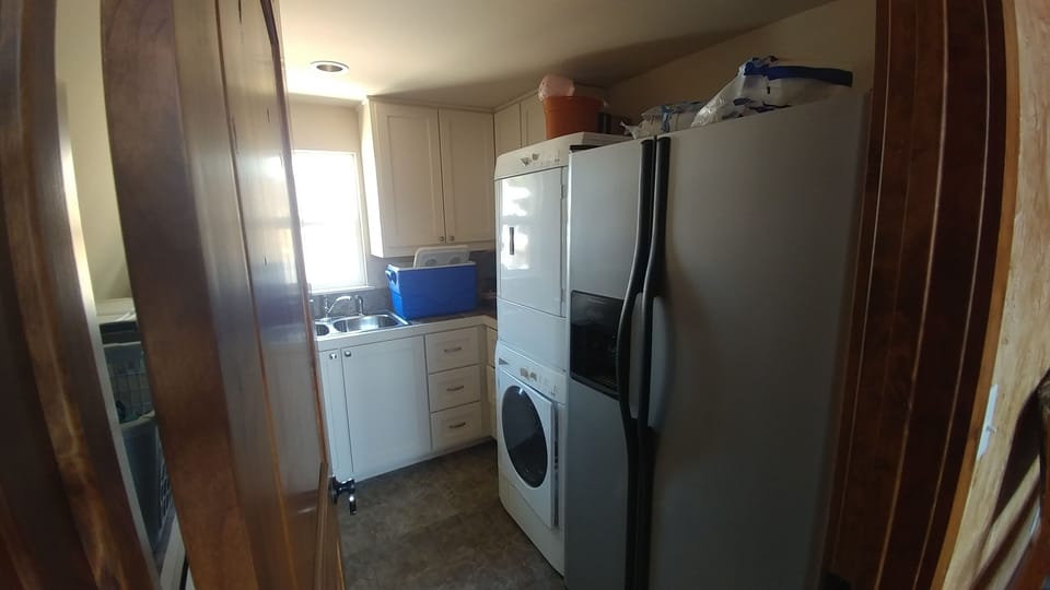 Laundry and extra fridge 
