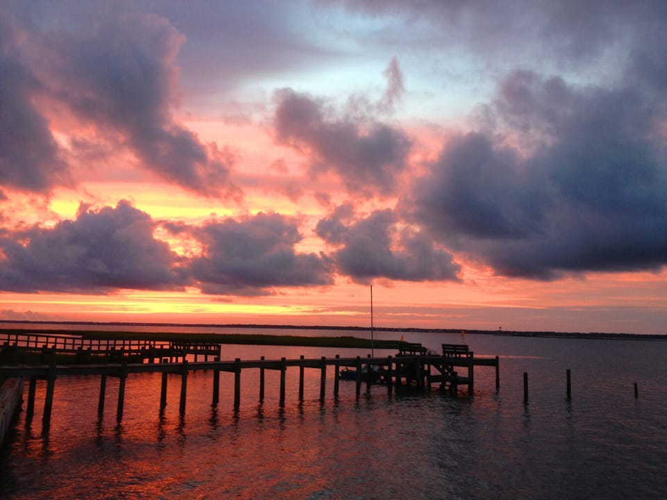Sunset over Bogue Sound from the public access a block over behind the cottage