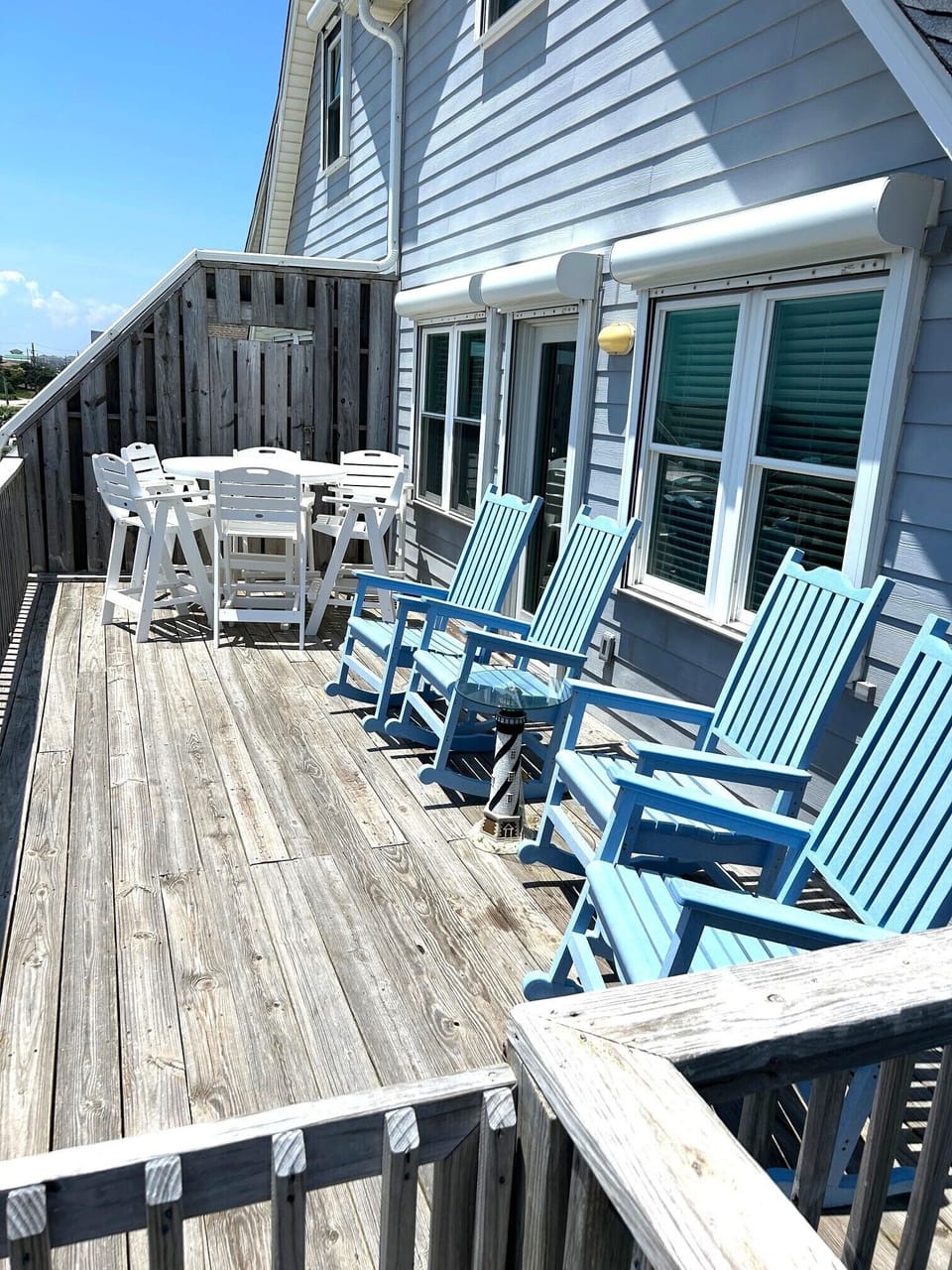 Third level top deck with great ocean views and door to main living room/den 