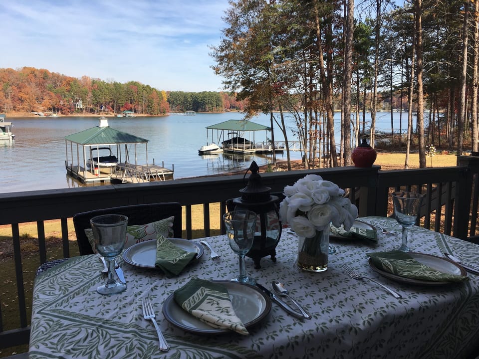 Enjoy dining on back deck with friends and family with beautiful view of lake
