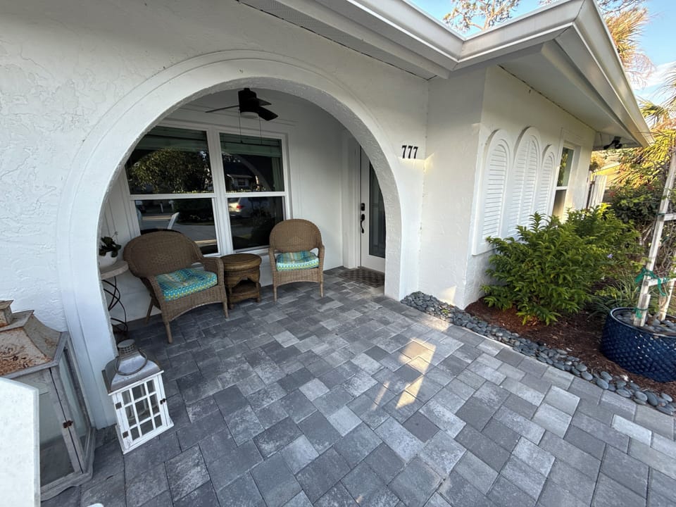 A gentle, no-step paver walkway gives easy access to the front door.
