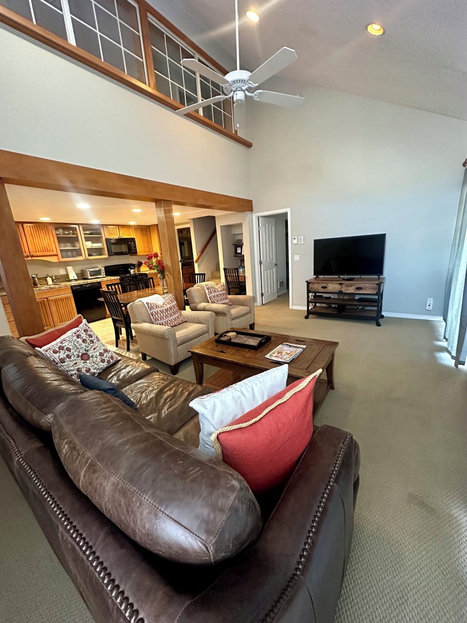 Living area with couch and two chairs
