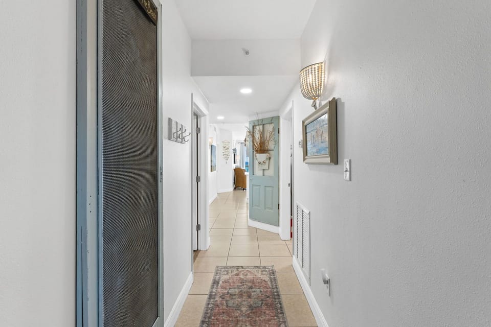 Welcoming Entry Hallway with access to bunk, guest, laundry room and 2nd bath  