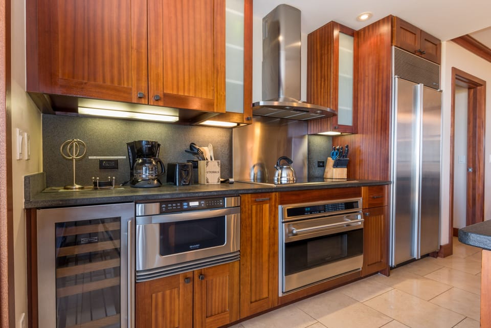 Cook meals with high-end appliances, including a wine cooler.