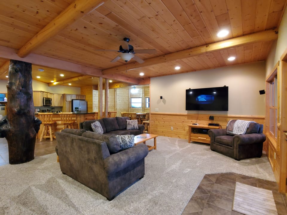 Lower walk out level family room with 2 queen memory foam pull out sofas
