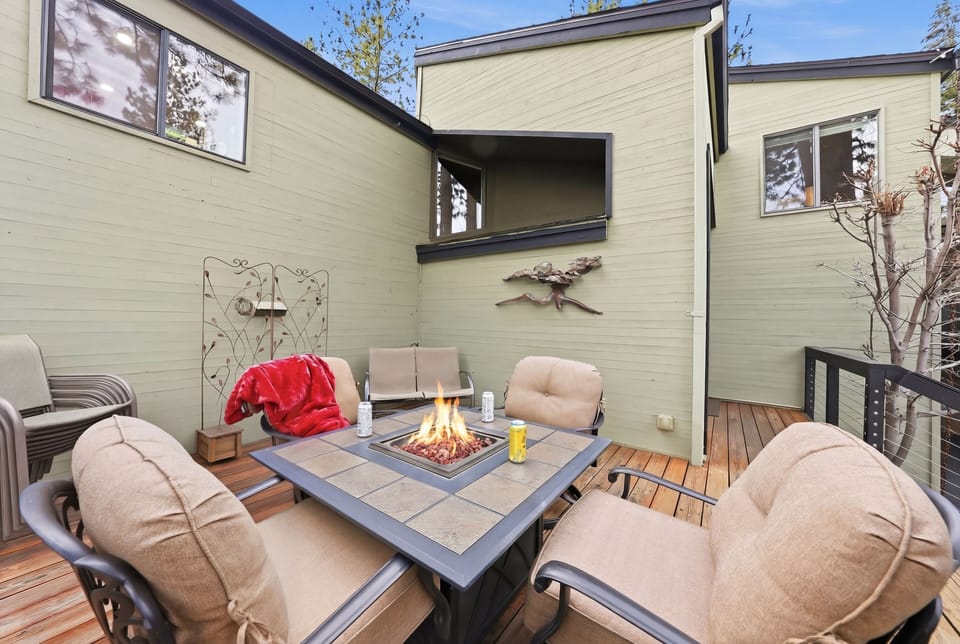 Warm and cozy fire table patio made for memorable nights together