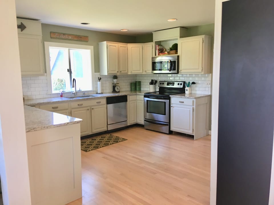 Granite and stainless steel appliances.