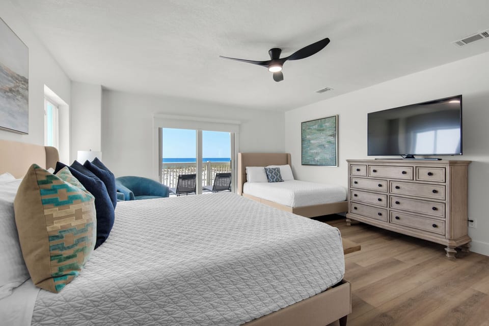 Main floor master bedroom with additional bed
