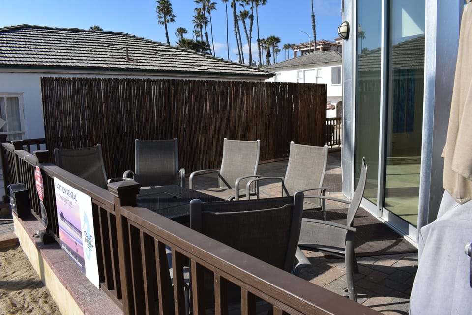 Patio with fire table and seating for six.