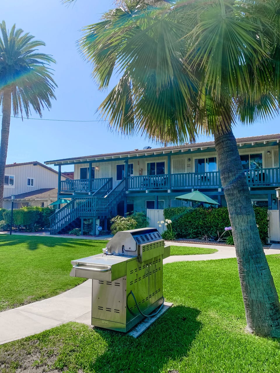 Gas grill available for guest use in the courtyard. The Coastal Casita is straight ahead upstairs.