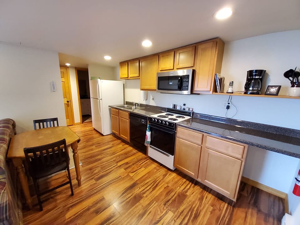 Kitchen - Microwave, dishwasher, full size refrigerator, stove