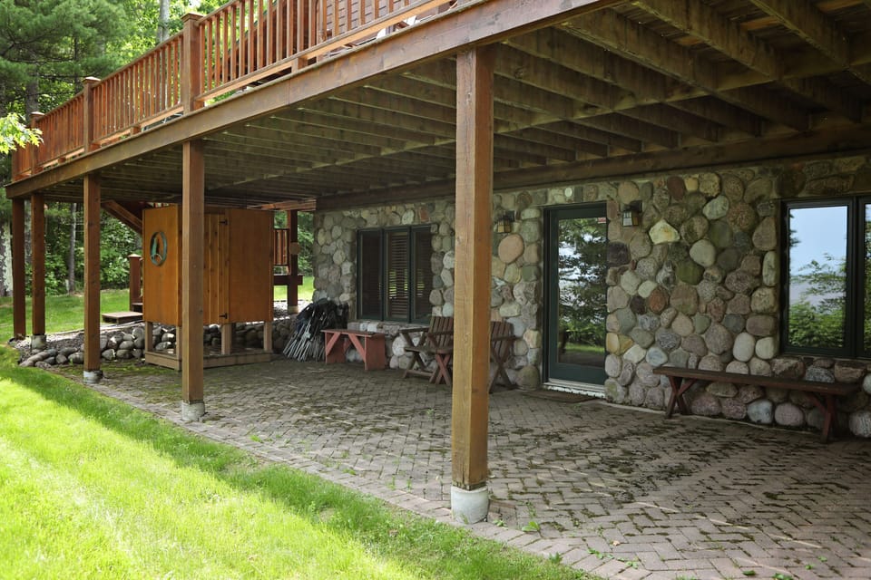 Outside the basement, facing the lake.  Outdoor shower on far left.