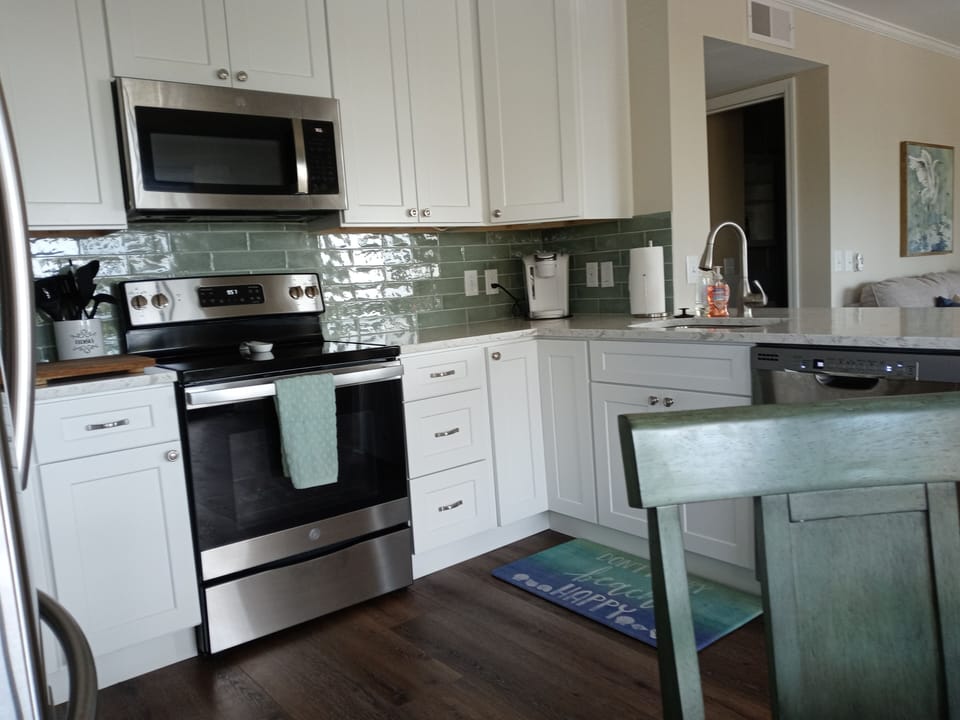 Kitchen has a Keurig coffeemaker
