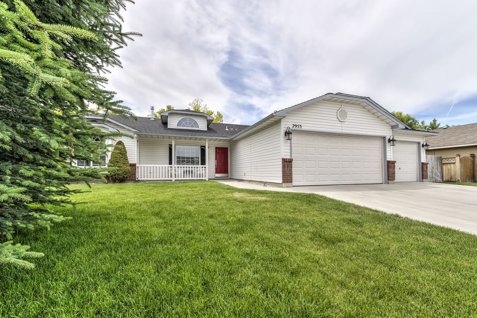 Front elevation, fully fenced yard with covered back patio including gas BBQ