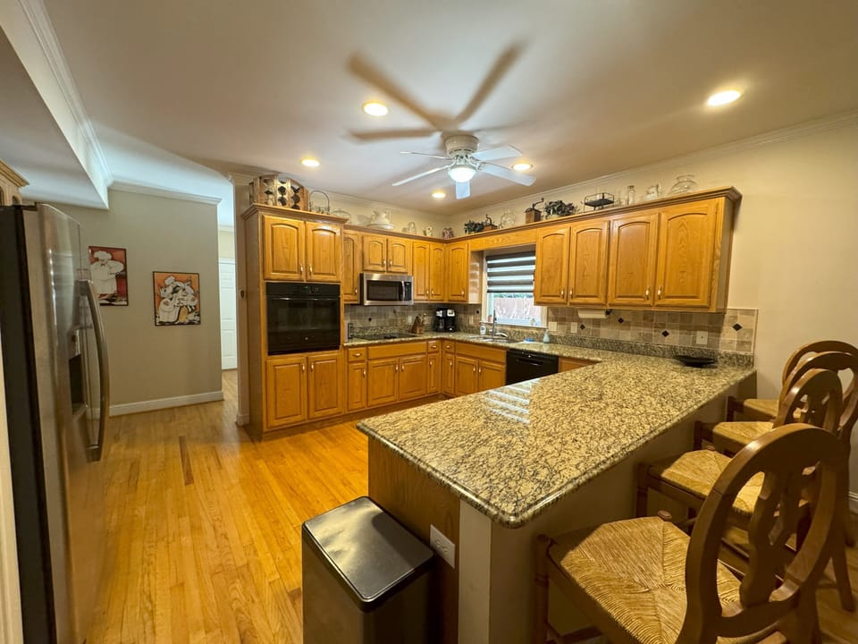 Huge fully equipped kitchen with loads of counter space & extra large fridge.