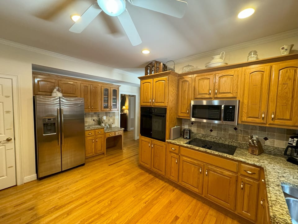 Huge fully equipped kitchen with loads of counter space & extra large fridge.