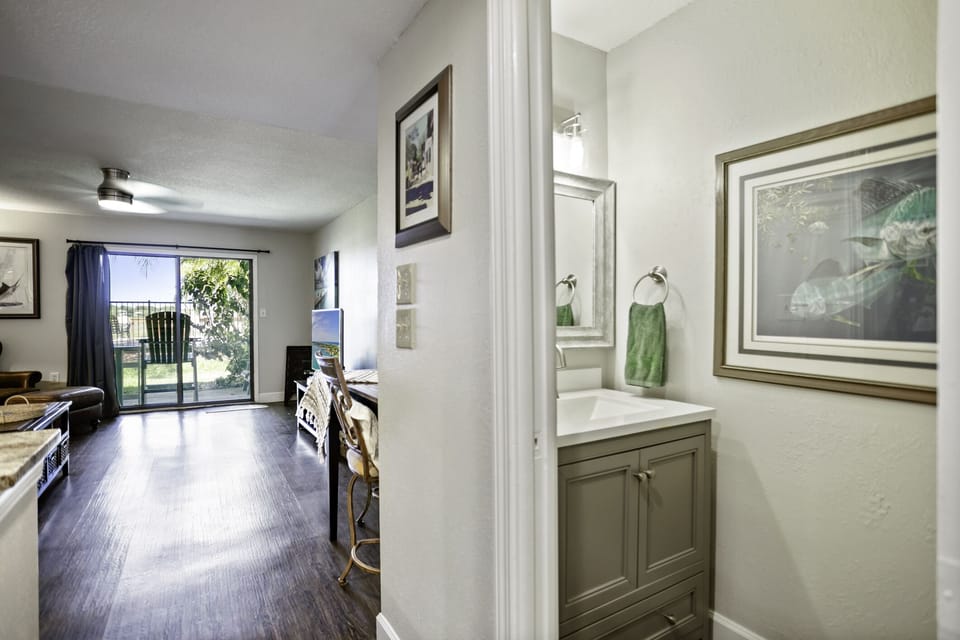 1/2 bath downstairs looking out back patio