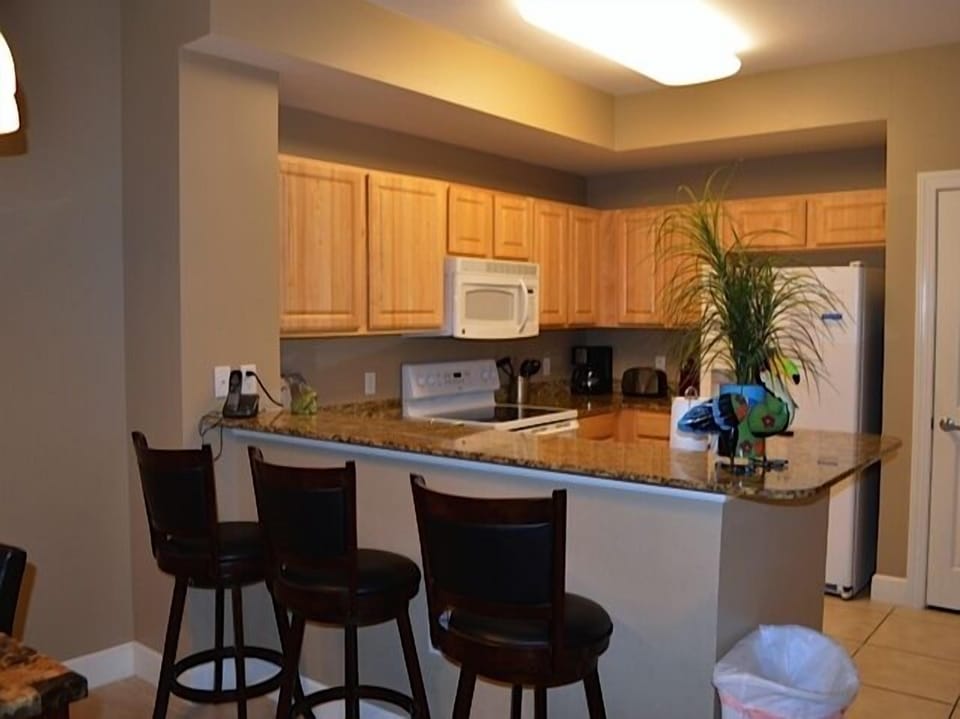 Large kitchen with bar