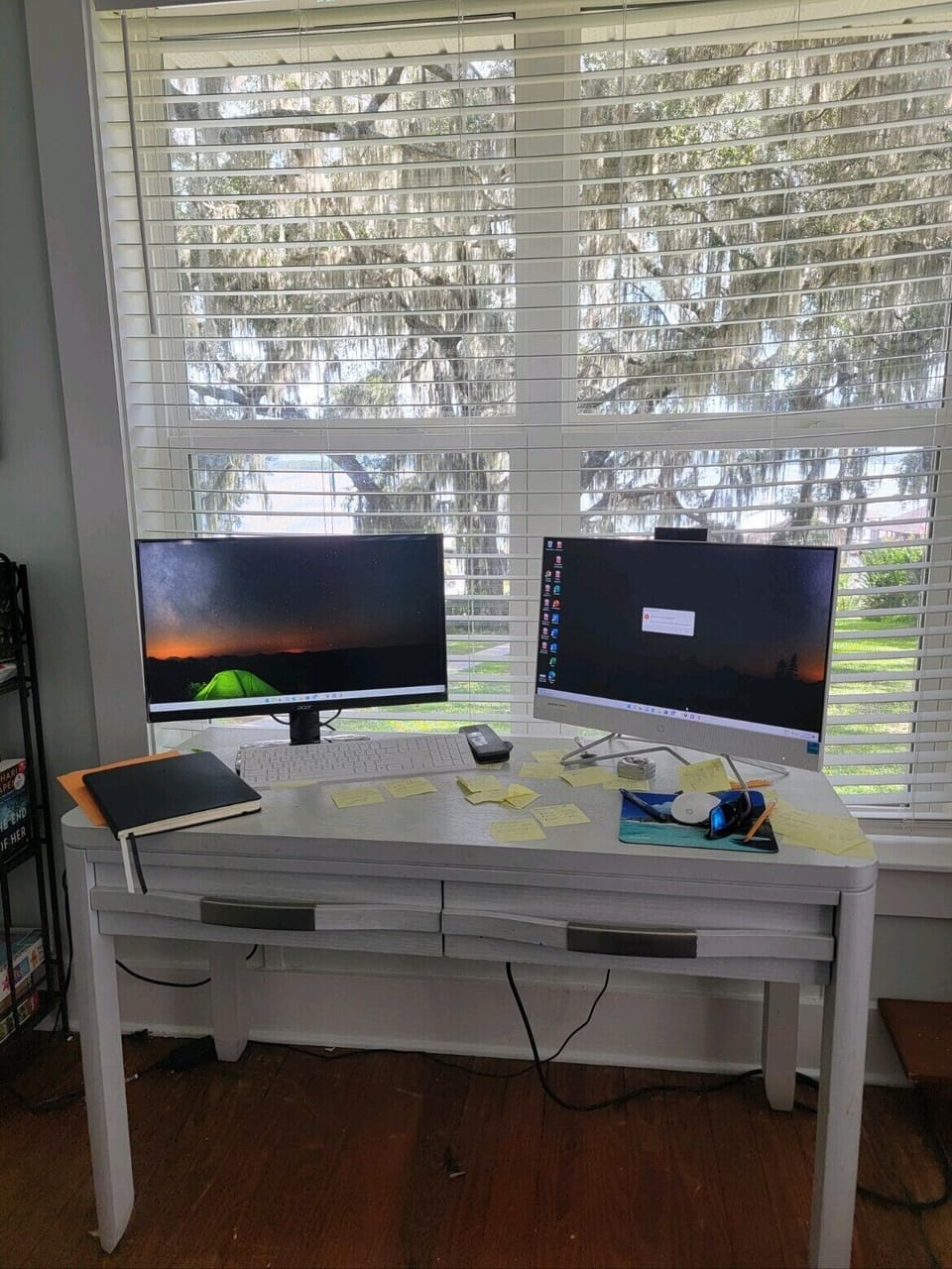 Office nook, with computer, 2nd monitor and color printer, with view.