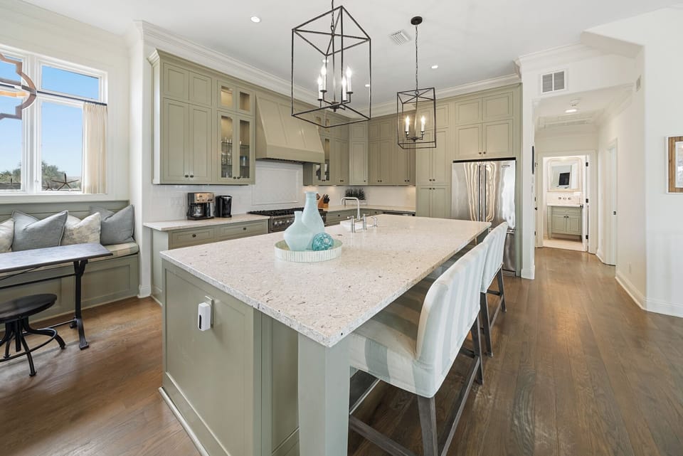 Create culinary magic in your spacious gourmet kitchen with premium granite countertops, elegant cabinetry, and modern appliances.