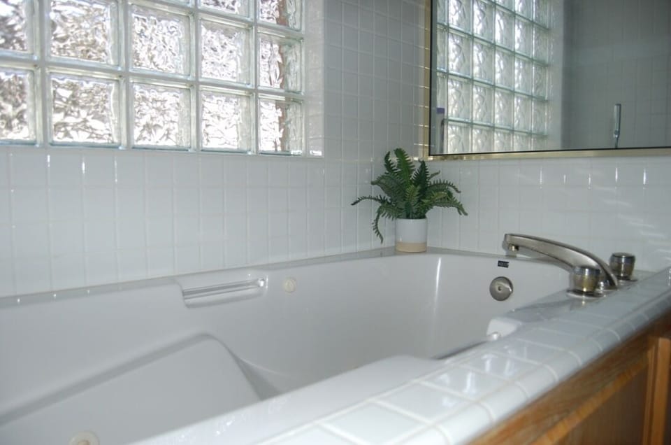 Tub in Master Bedroom on first level.