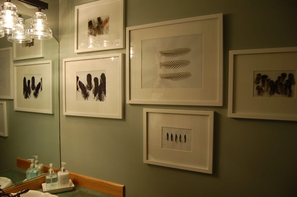 Artwork in 1/2 bathroom on first level.