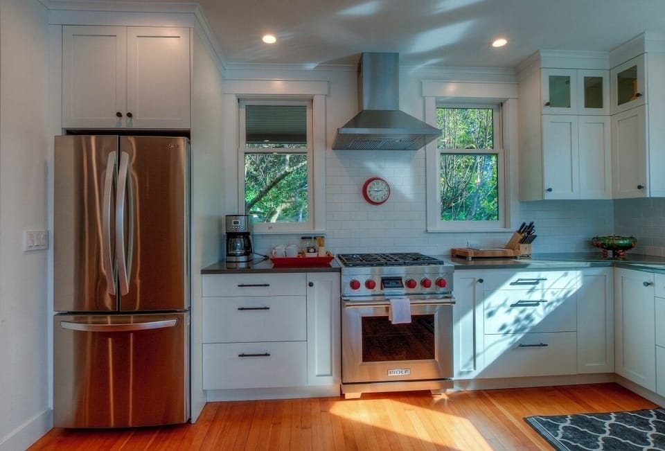 High-end appliances including Wolf gas stove.