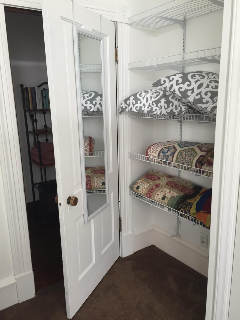hallway to bedrooms, kitchen & bathroom