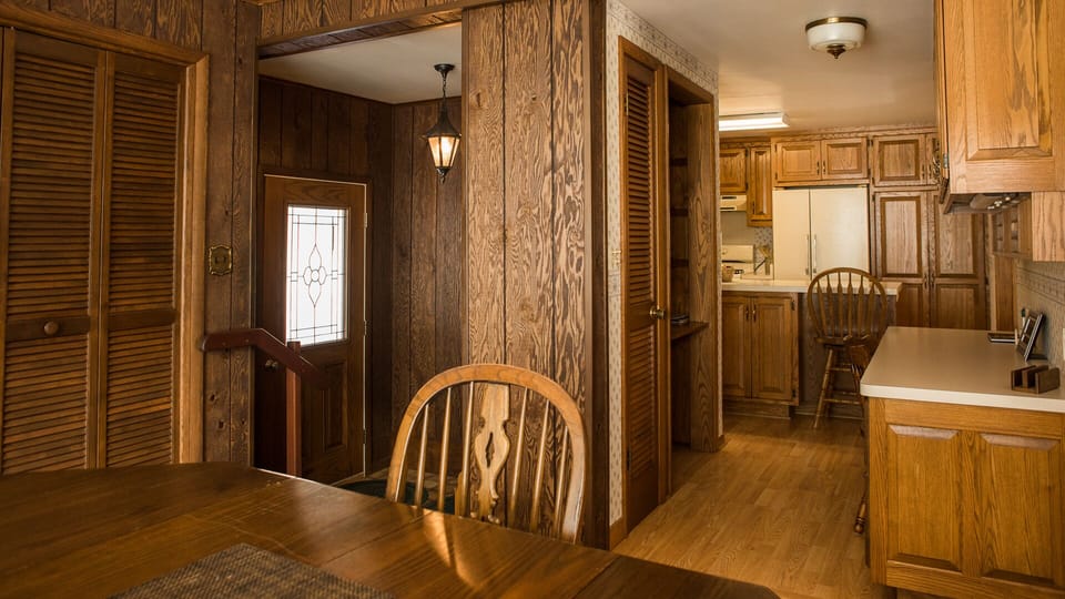 Looking at foyer and kitchen from family room table