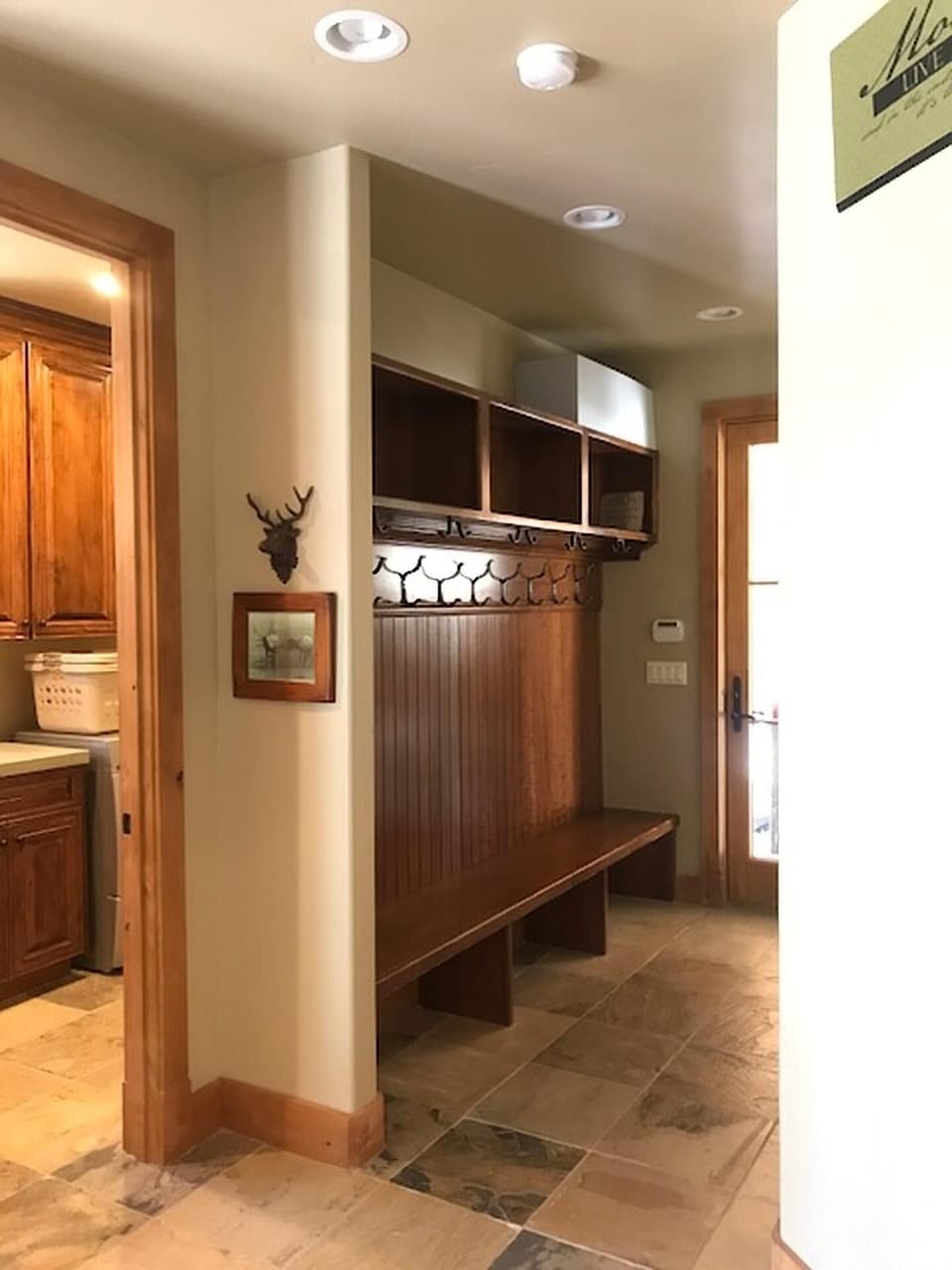 Mudroom/hallway entrance off of breezeway with quick access to laundry room.
