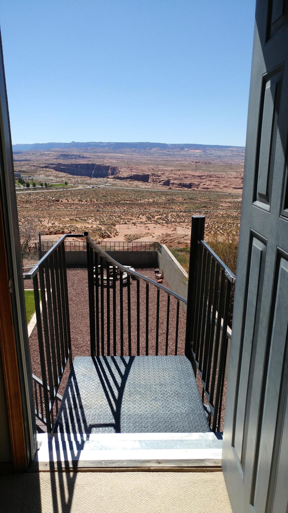 Upper bedroom suite with a door leading out to spiral staircase and VIEWS!