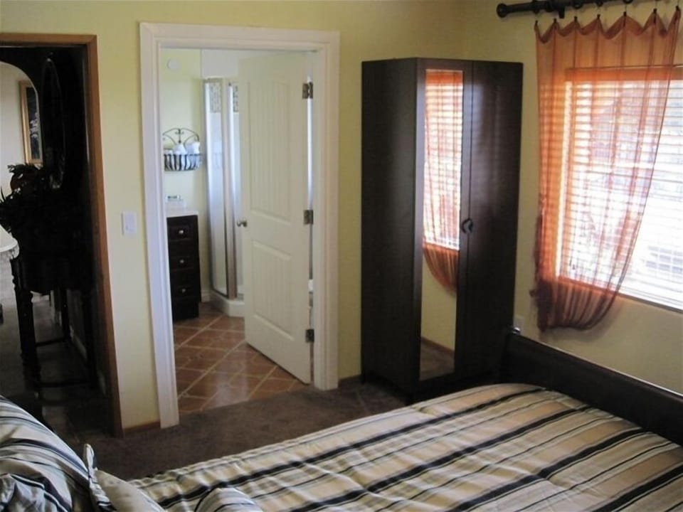Room #1 with queen bed and private bathroom. (sleeps 2)