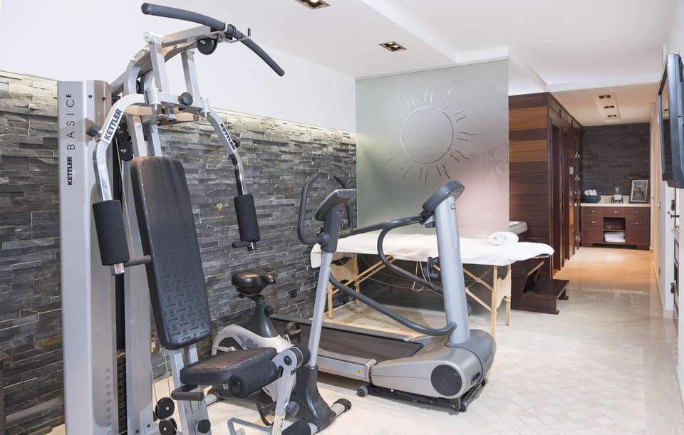 In house gym and a massage table