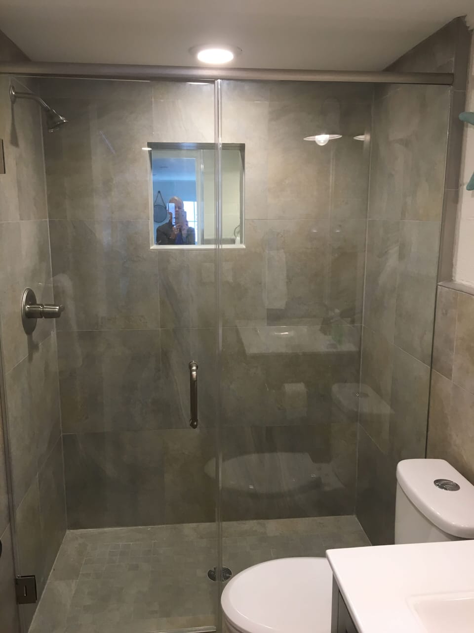 Updated walk in shower! This bathroom is off hallway. 