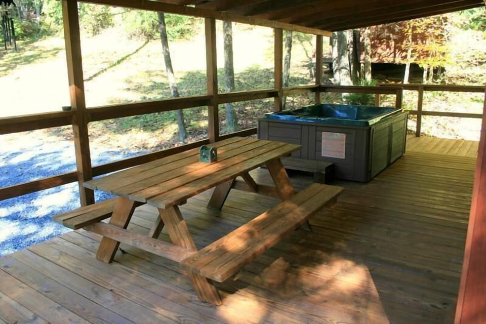Deck, Hot Tub and Picnic Table Under Covered Deck.