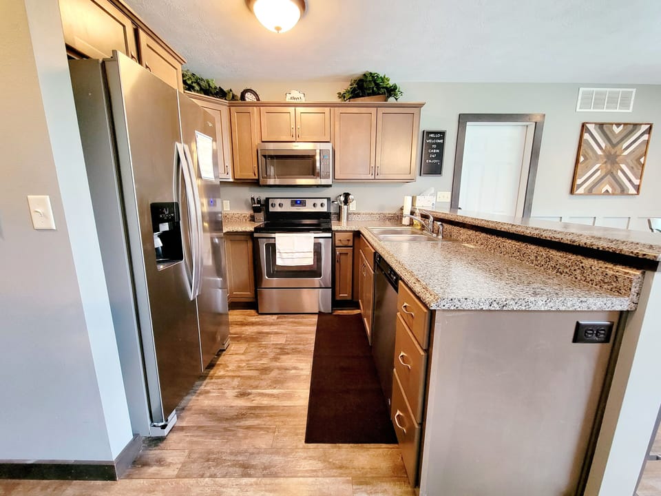 Complete with a regular coffee pot, keurig and ice maker in fridge. 