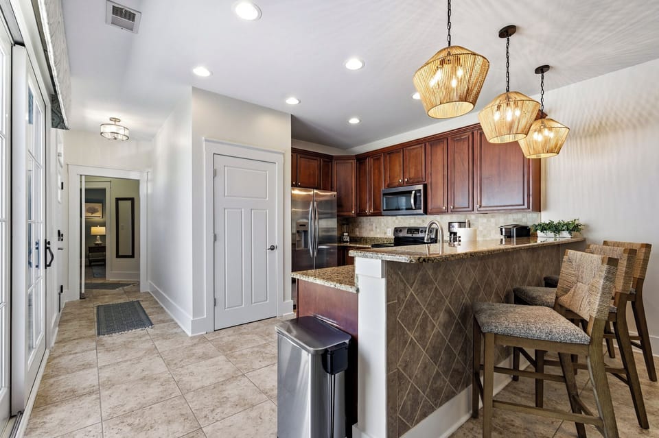 Our kitchen has a stand mixer, toaster, blender, Keurig, coffee maker.