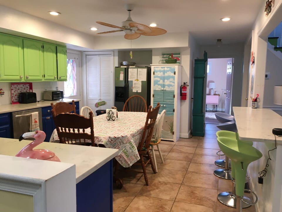 Enjoy cooking in fully stocked kitchen. Hallway to bedrooms and full bath. 
