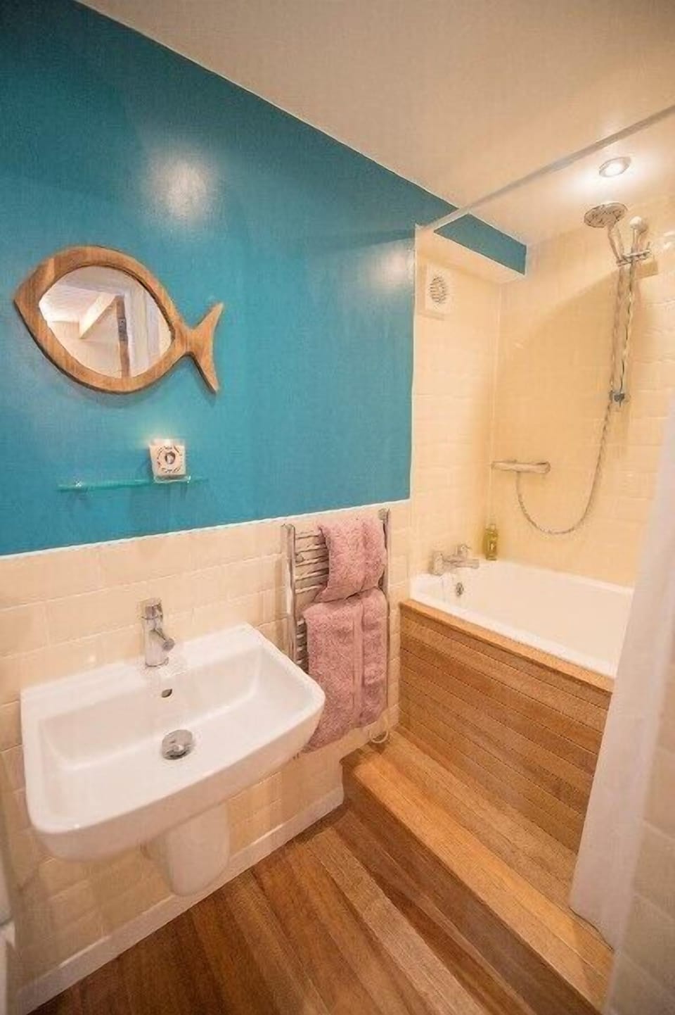 Bathroom with deep sinking Japanese bath tub.