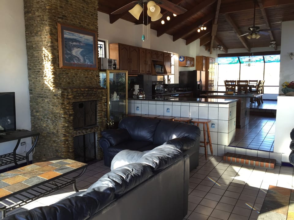 View from living room through the kitchen to the dining room.  
