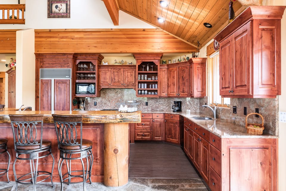 Kitchen with pine bar island eat in area